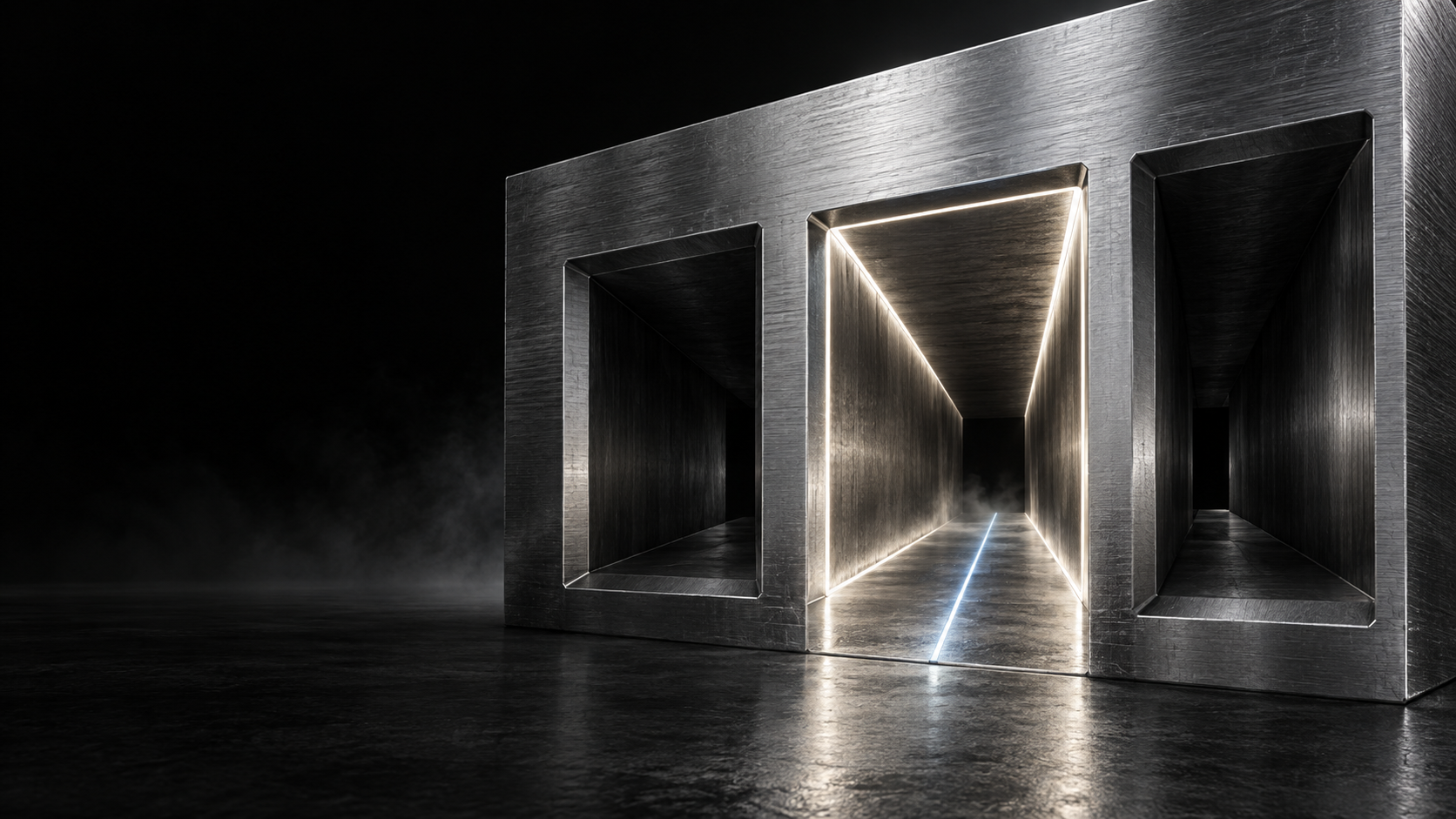 Three machined metal tunnels with one illuminated central route